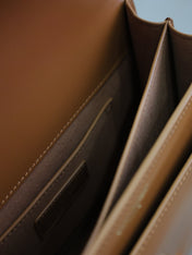 YSL 25S SUNSET BAG 22 IN DARK CARAMEL CALFSKIN GOLD HARDWARE
