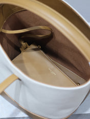 YSL 25S LE 5 À 7 BUCKET 26 IN CREAM BROWN CALFSKIN AND CANVAS GOLD HARDWRE