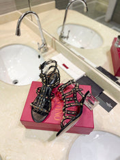 ROCKSTUD SANDAL WITH STRAP IN BLACK CALFSKIN 60 MM