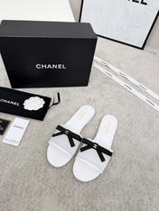 CHANEL 26S SLIDE SANDALS IN WHITE MESH AND CALFSKIN WITH BLACK RIBBON