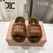MIUMIU 26S FLAT SLIDES IN BROWN SHEARLING