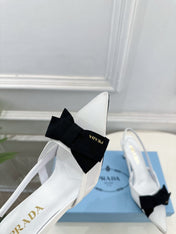 PRADA 26S POINTED-TOE SLINGBACK HEELS 75MM IN WHITE MESH WITH BLACK BOW