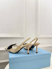 PRADA 26S POINTED-TOE SLINGBACK HEELS 75MM IN BEIGE MESH WITH BLACK BOW