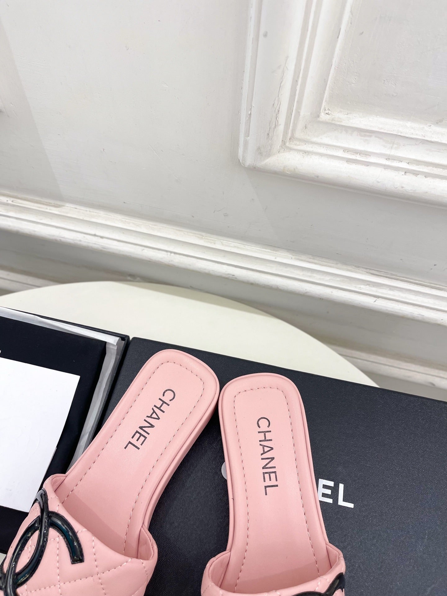 CHANEL 26S FLAT SLIDES IN LIGHT PINK LAMBSKIN WITH BLACK CC LOGO