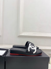 CHANEL 26S FLAT SLIDES IN BLACK LAMBSKIN WITH WHITE CC LOGO