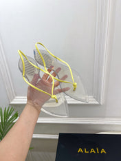 ALAIA 26S POINTED-TOE THONG SANDALS IN YELLOW AND TRANSPARENT PVC