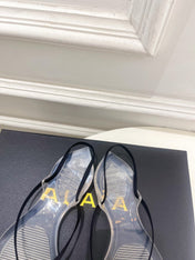 ALAIA 26S POINTED-TOE THONG SANDALS IN BLACK SATIN AND TRANSPARENT PVC