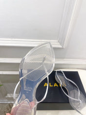 ALAIA 26S POINTED-TOE THONG SANDALS IN WHITE SATIN AND TRANSPARENT PVC