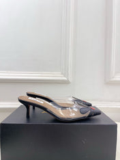 ALAIA 26S MULE HEELS 55 MM IN BLACK LAMBSKIN AND TRANSPARENT PVC