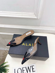 ALAIA 26S MULE HEELS 55 MM IN BLACK LAMBSKIN AND TRANSPARENT PVC