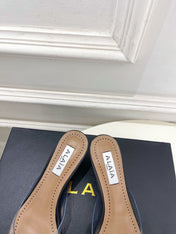 ALAIA 26S MULE HEELS 55 MM IN BLACK LAMBSKIN AND TRANSPARENT PVC