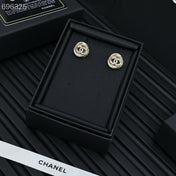 25S TWISTED RIBBED DOUBLE C STUD EARRINGS IN GOLD METAL