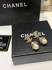 CHANEL 26S DOUBLE C LOGO PAVE CRYSTAL DROP EARRINGS WITH PEARL CHARM IN GOLD METAL 633339