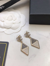 CHANEL 26S DOUBLE C LOGO TWO TONE PAVE CRYSTAL DIAMOND SHAPE DROP EARRINGS IN GOLD METAL 631833